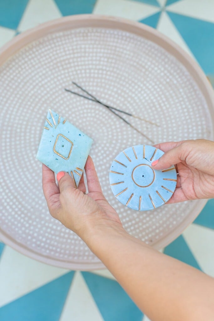 incense holders in hands