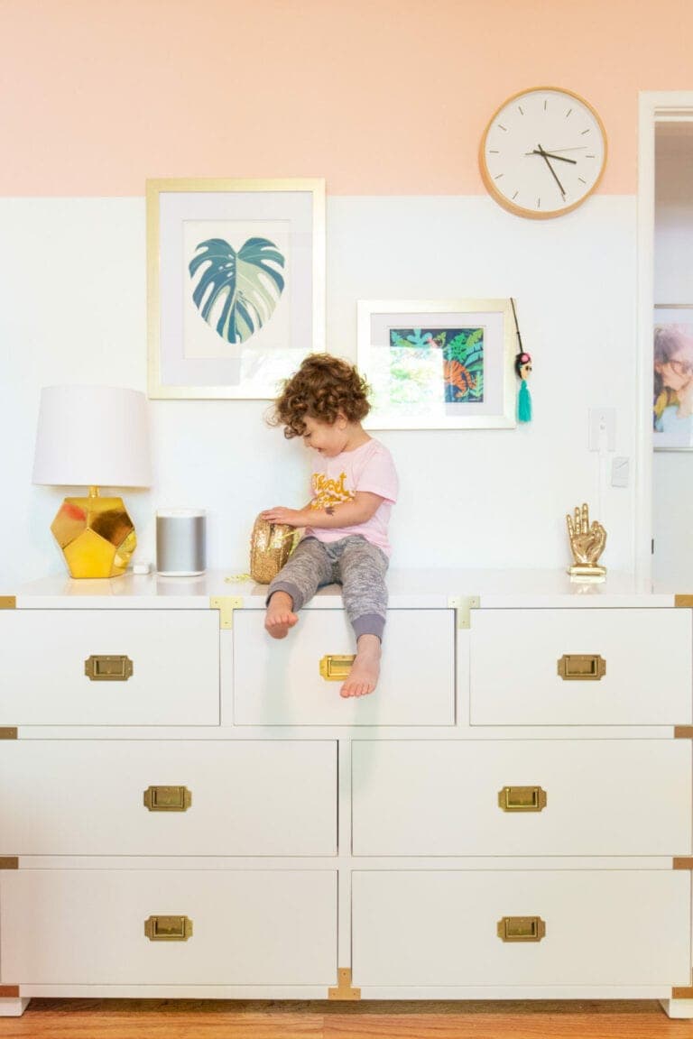 Colorblocked pink paint in a kids' room