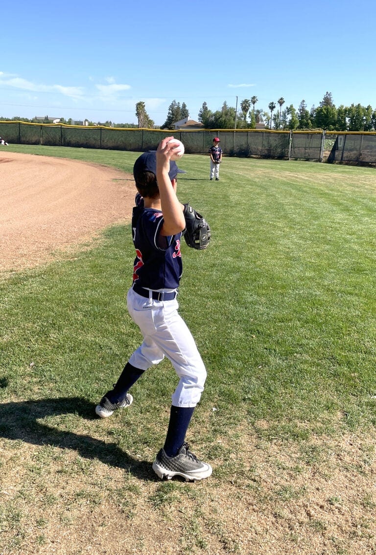 boy playing baseball