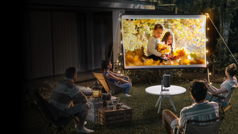 People using Dangbei N2 in their yard at night