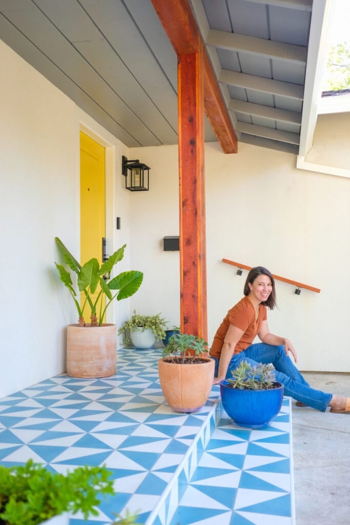 tile front porch with woman sitting