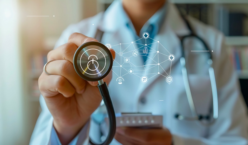 Doctor holding a measuring device in hand